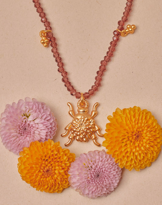 Entrelazos Escarabajo Necklace – Garnet Charm Necklace