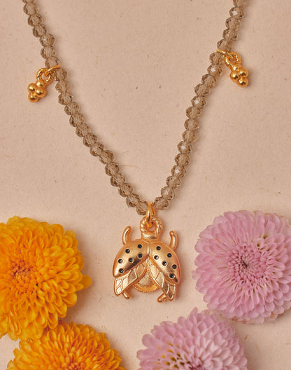 Entrelazos Mariquita Necklace – Lucky Ladybug Charm